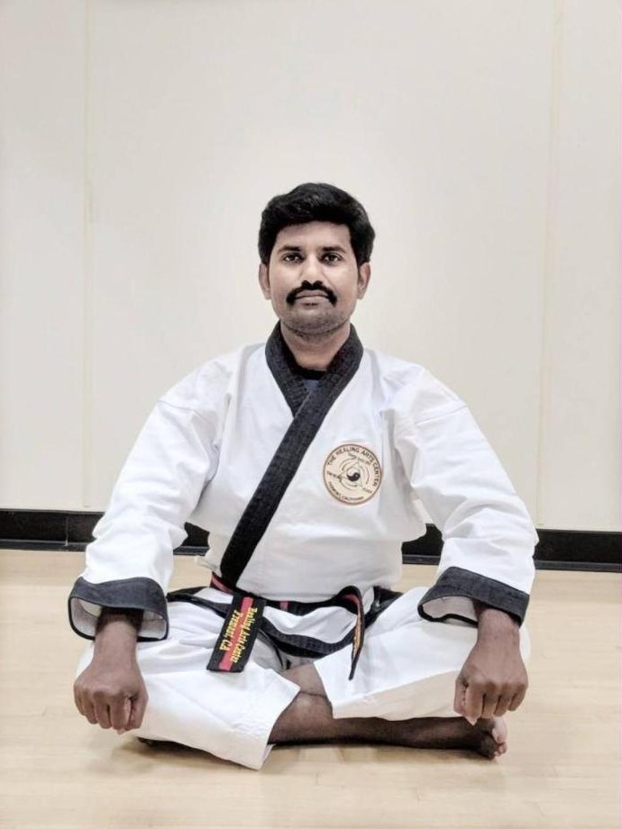 Master Thirumoorthy Gunasekaran seated in meditation